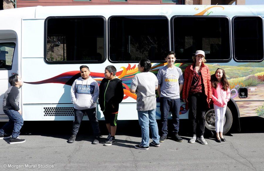 Painted Bus with Kids and Mural Artist