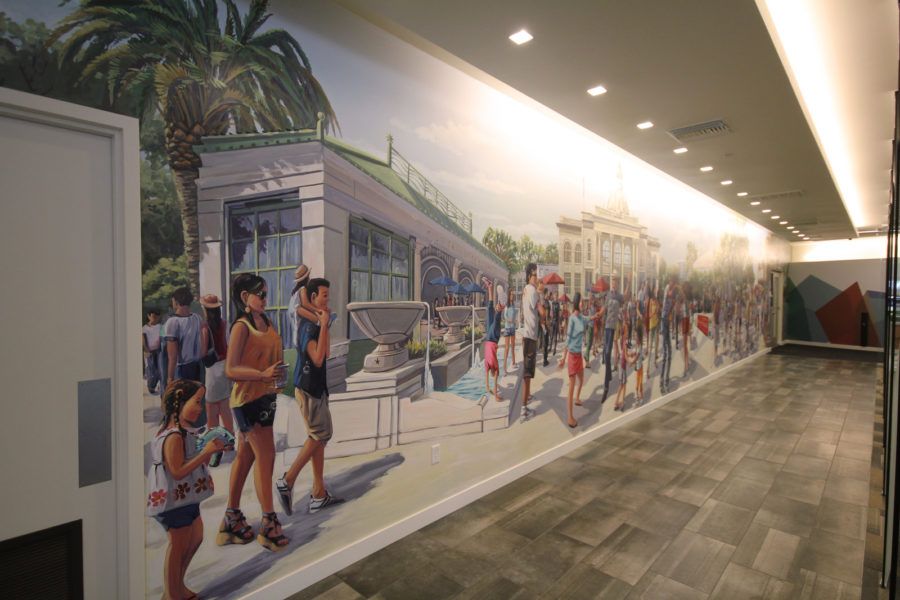 Large mural with urban crowd at San Mateo Credit Union in Redwood City