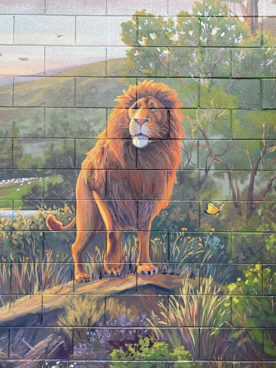 Handpainted Lion Mural on Cinderblock Wall