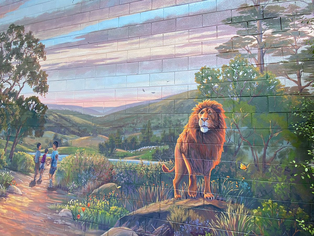 Handpainted Lion Mural with Lake Landscape