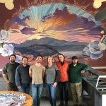 team photo in dining room.072733