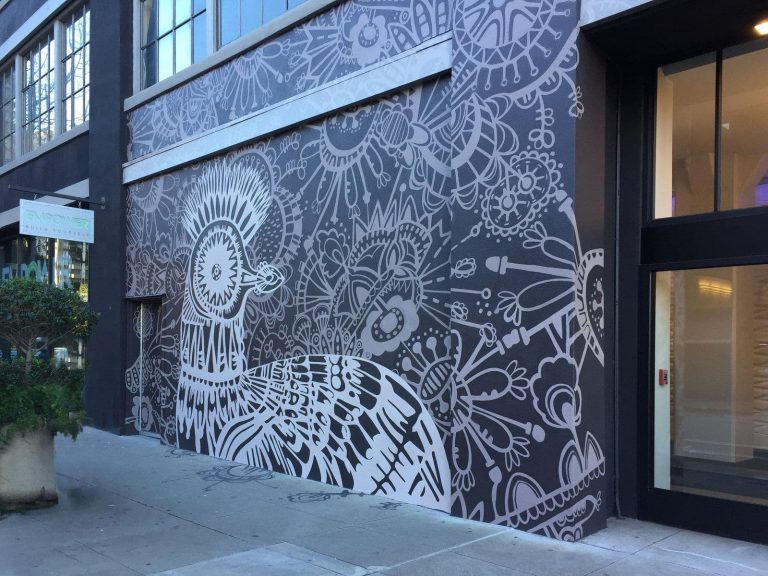 Patterned mural with bird and flowers