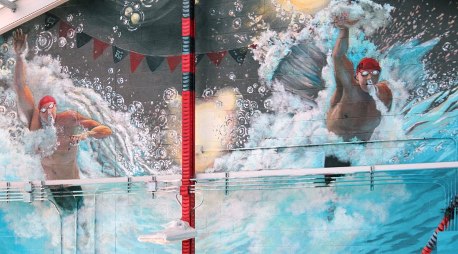 Swim Center Mural with Olympic Swimmers in Pool