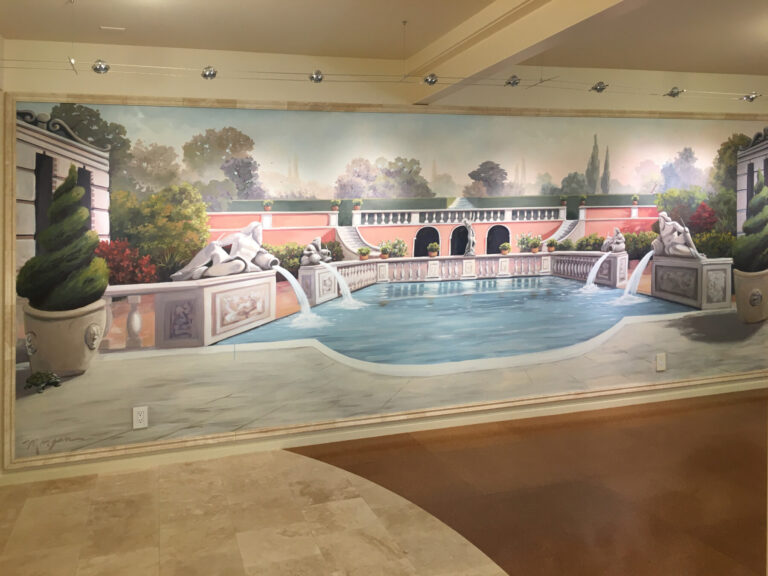 This trompe l’oeil mural mural makes this basement turned exercise room into a classy place to workout.