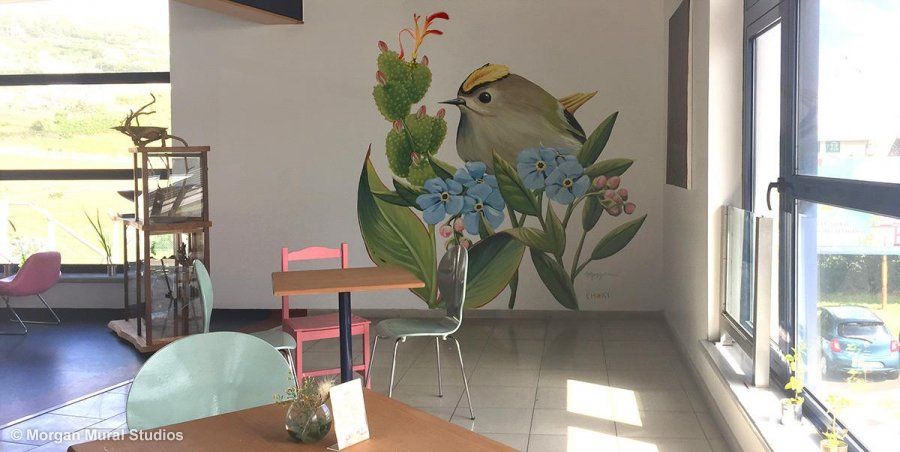 I painted this Goldcrest on a wall at the airport café, Café das Flores.