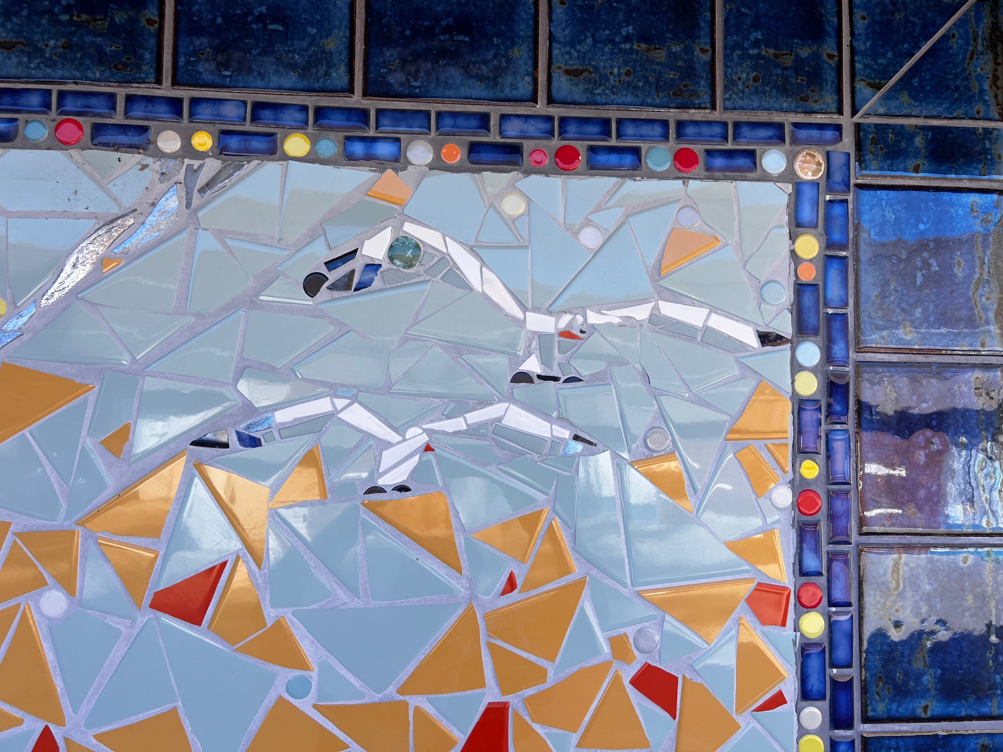 Mosaic of penguins at elementary school