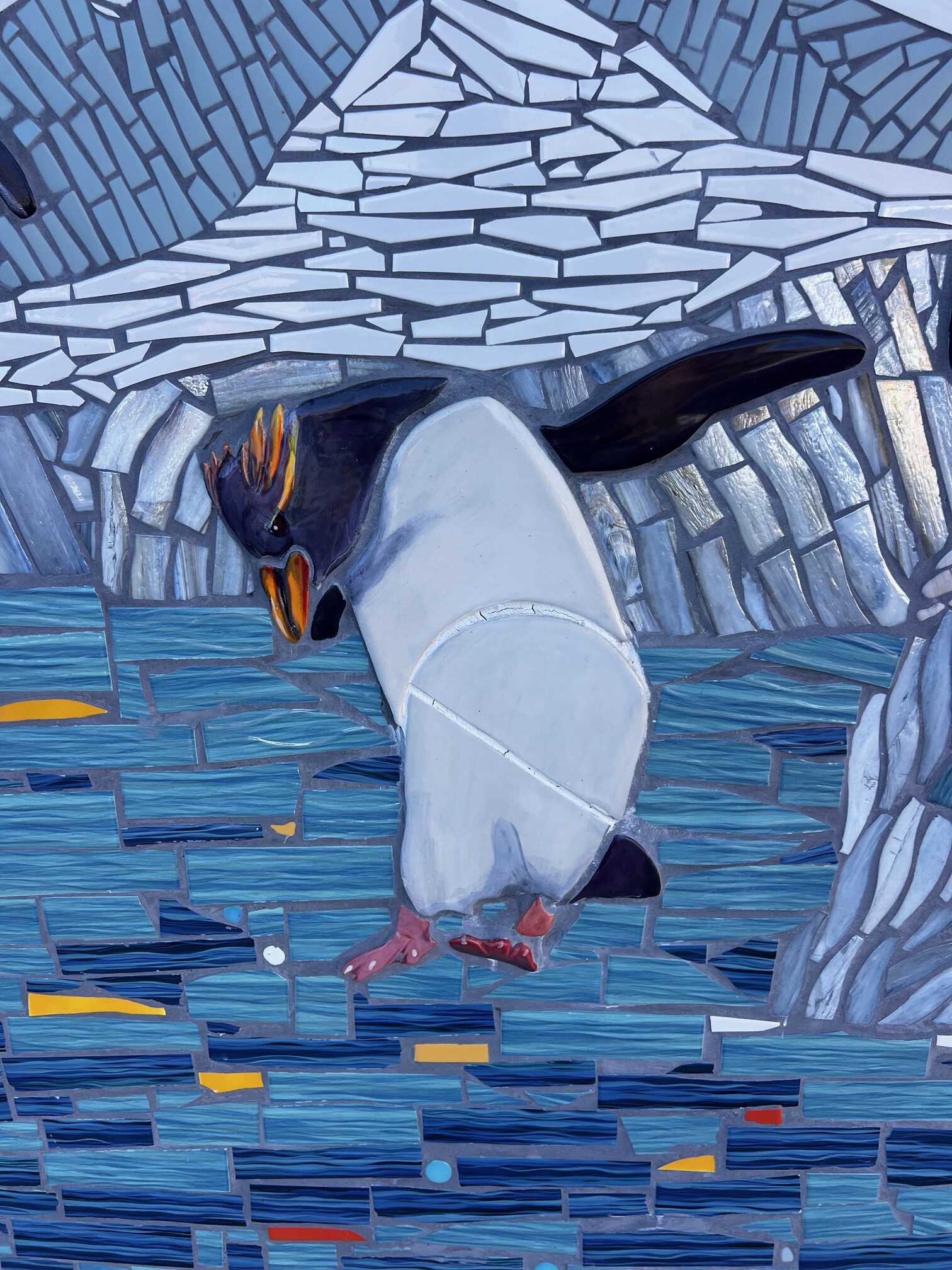 Mosaic of penguins at elementary school
