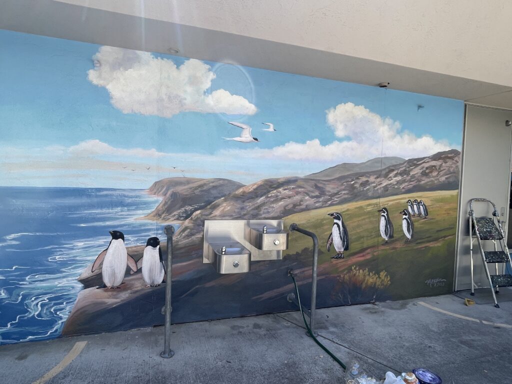 Adelie and Humboldt penguin species mural