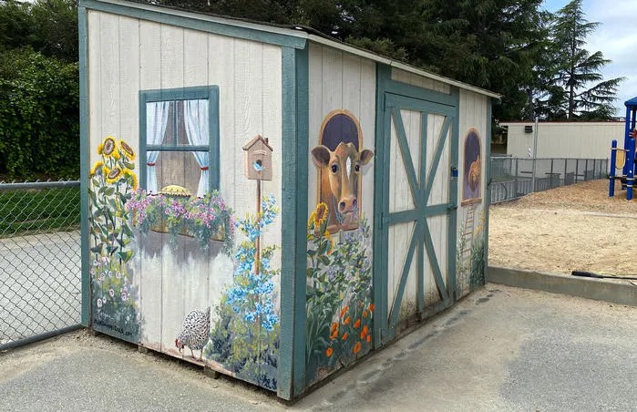 Cow Shed Mural Painted for School in 2008, refreshed in 2020