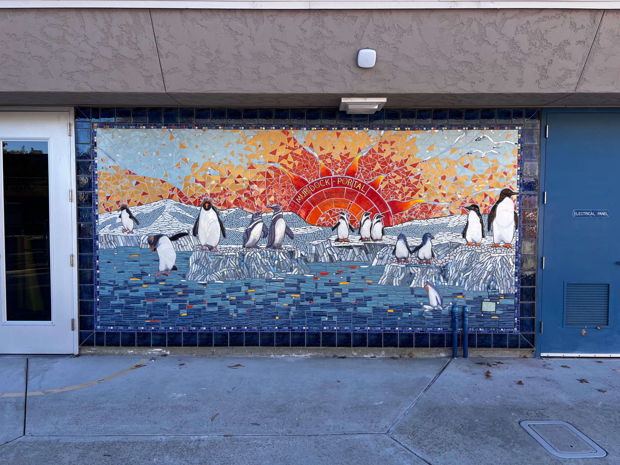 Mosaic of penguins at elementary school