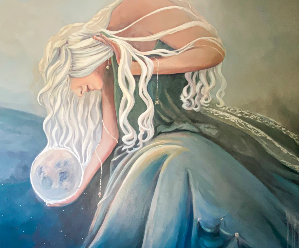 Residential mural of woman holding moon